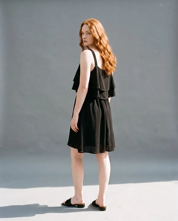 The same dress in a grey photo studio